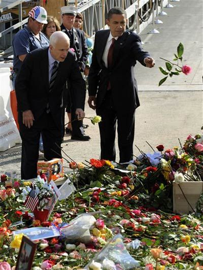 McCain and Obama throw flowers into the pools.